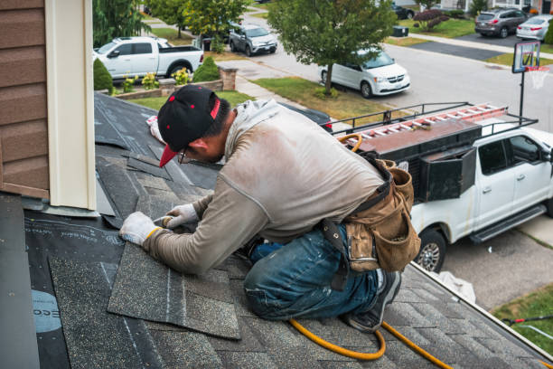 Professional Roofing technician working in Newton Center, MA